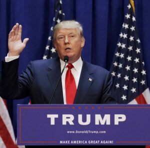 U.S. Republican presidential candidate, real estate mogul and TV personality Donald Trump gestures as he formally announces his campaign for the 2016 Republican presidential nomination during an event at Trump Tower in New York June 16, 2015. REUTERS/Brendan McDermid